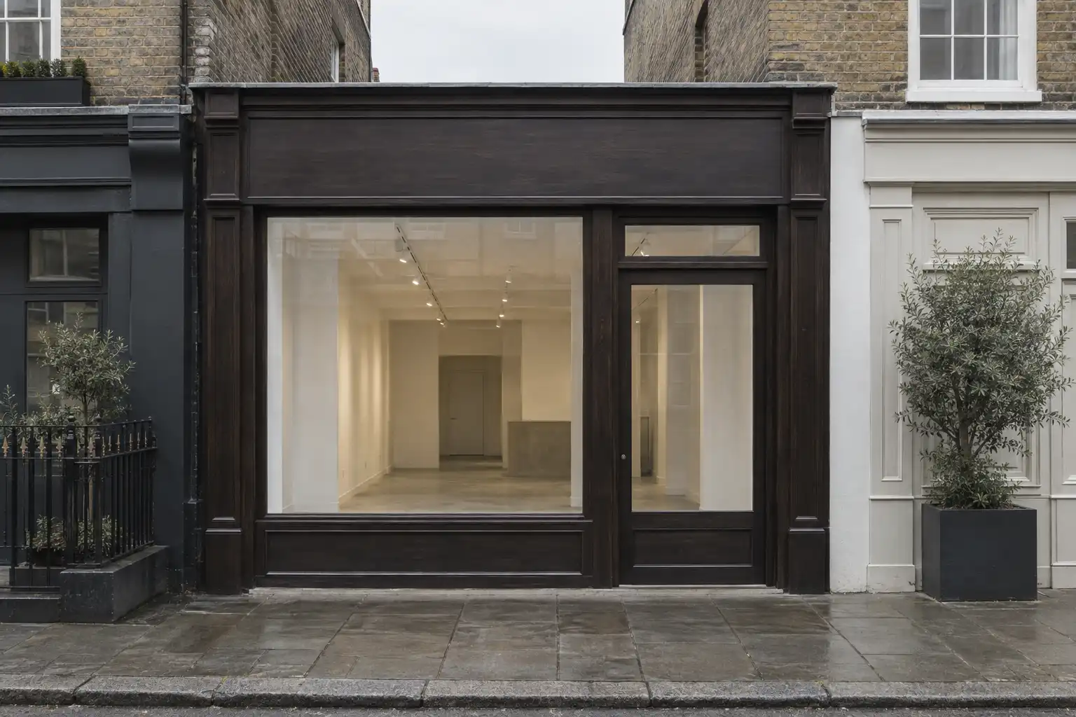 A narrow shop unit with a new timber shopfront, illustrative visualisation
